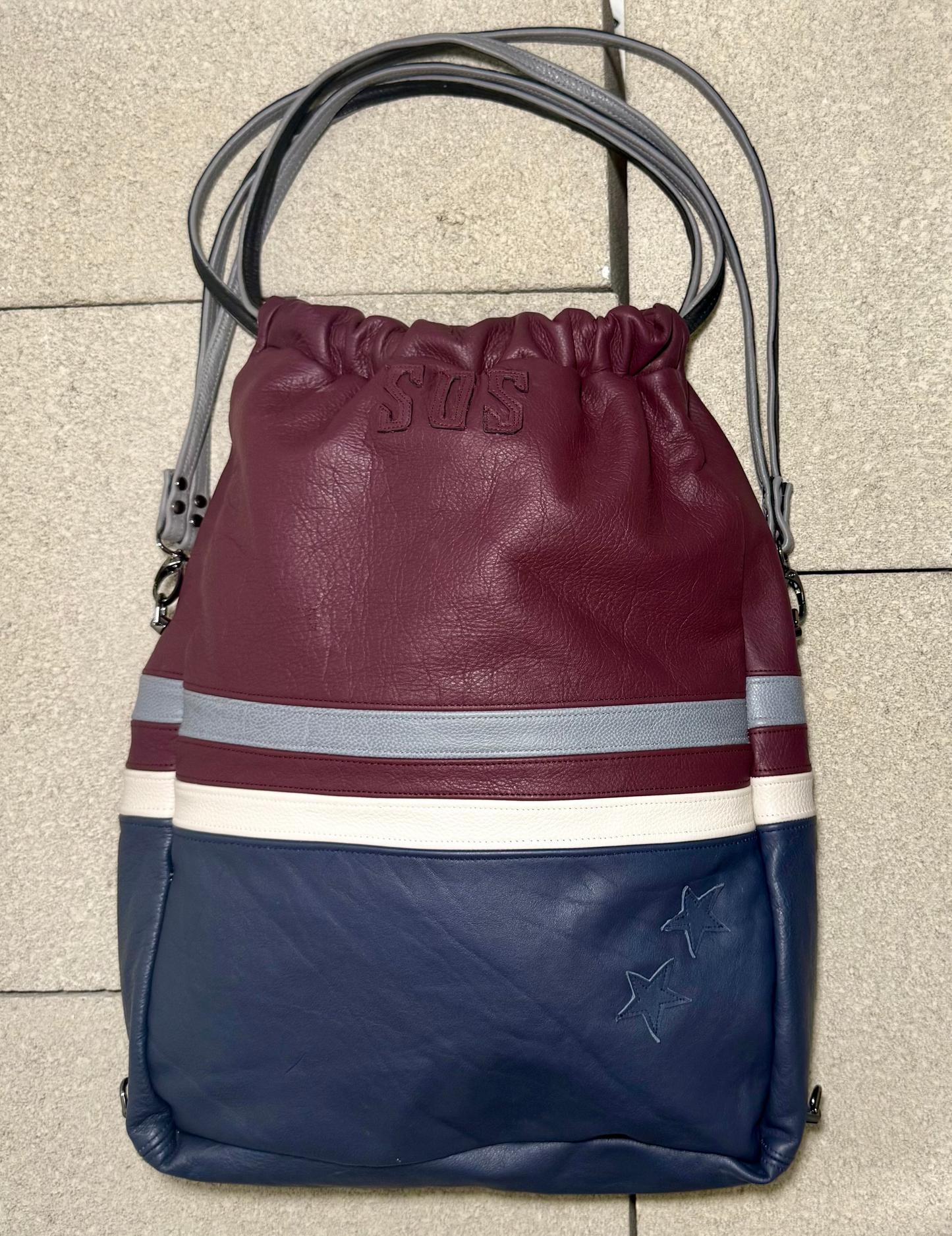 "ABYSS" CONVERTIBLE LEATHER BACKPACK