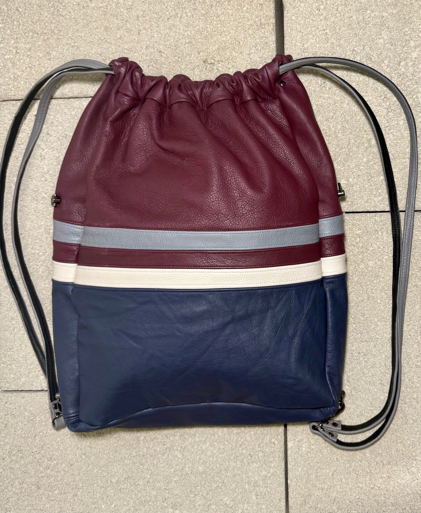 "ABYSS" CONVERTIBLE LEATHER BACKPACK