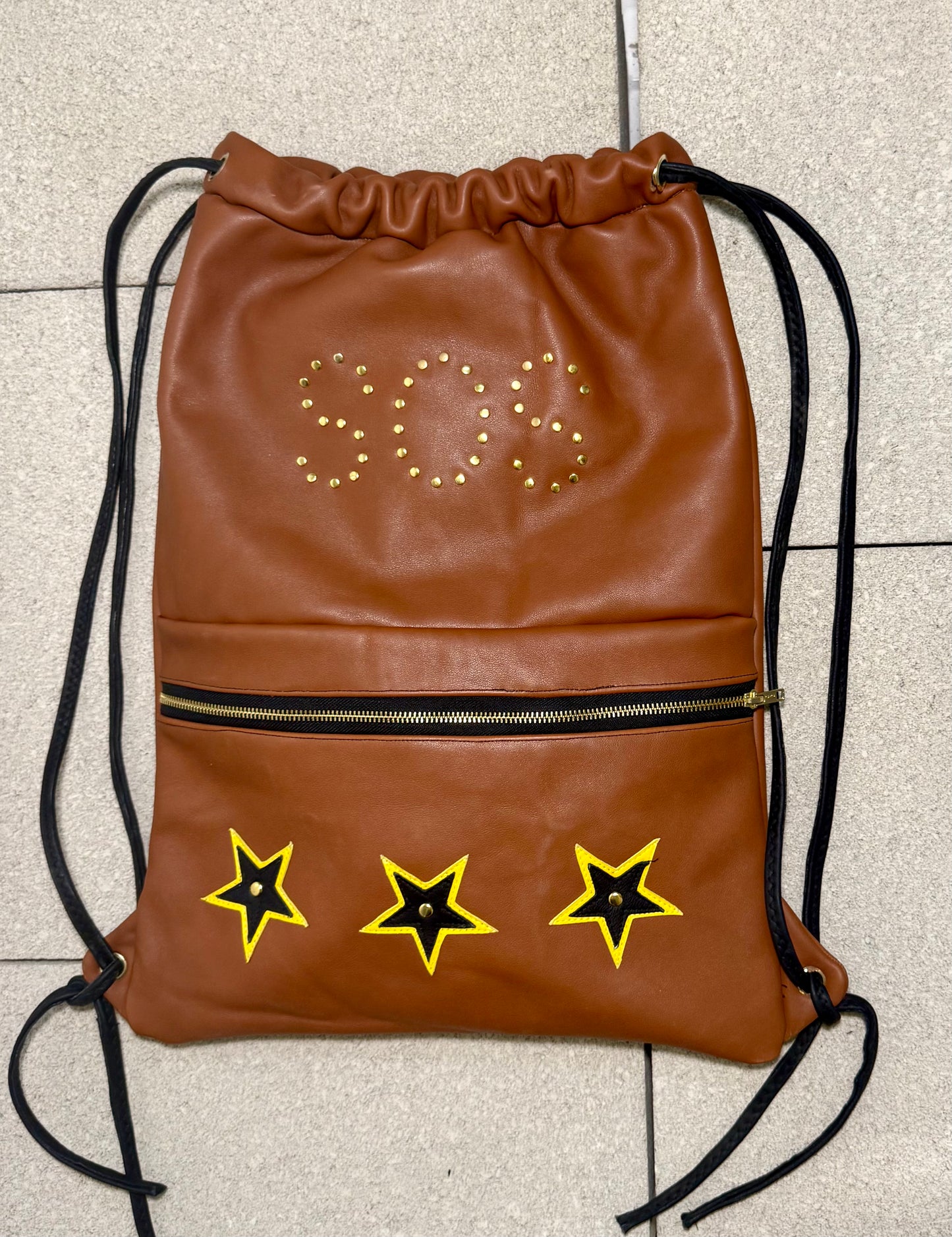 "VOYAGER" DRAWSTRING LEATHER GYM BAG