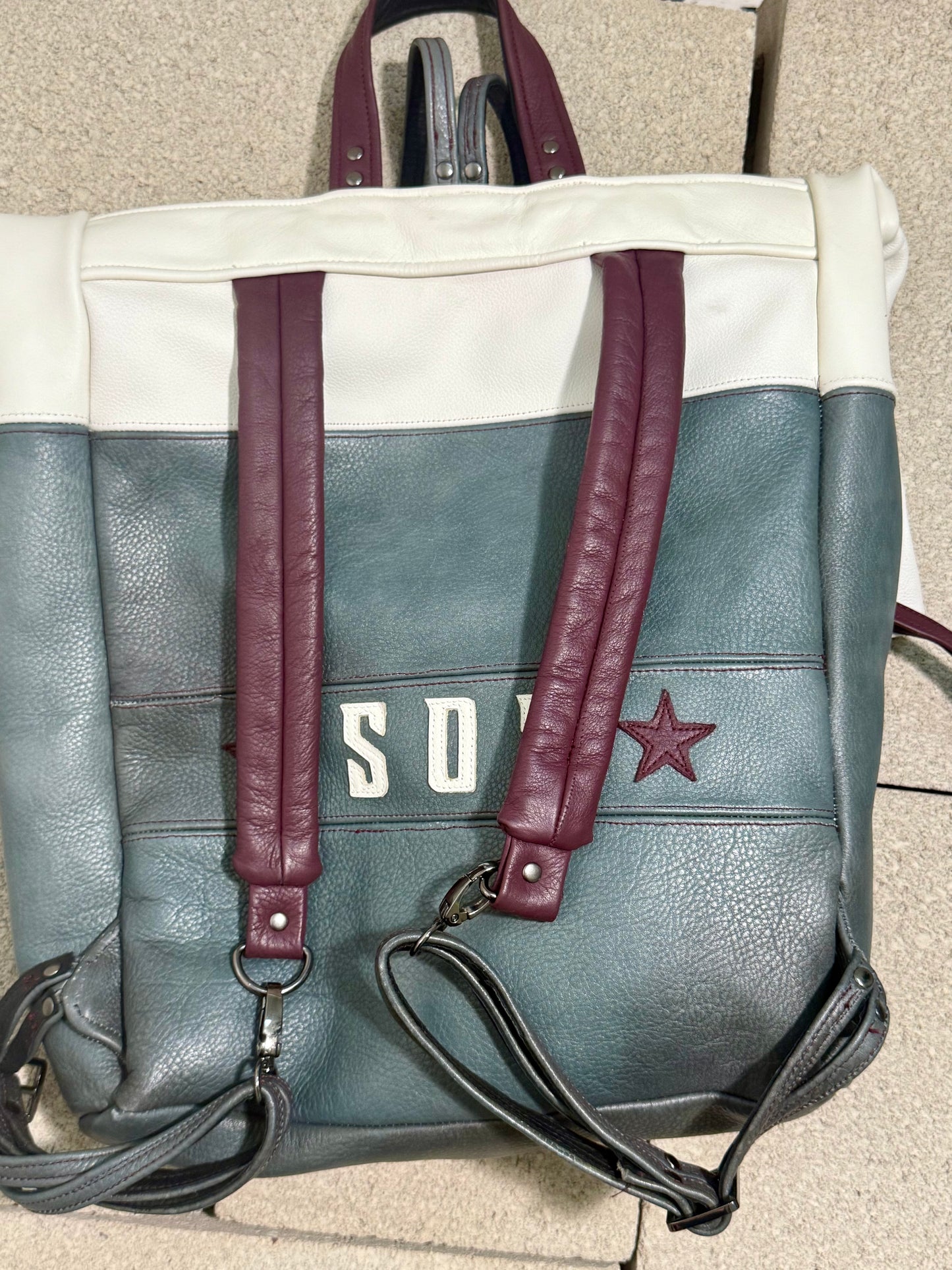 "INVADER" ROLL TOP LEATHER BACKPACK