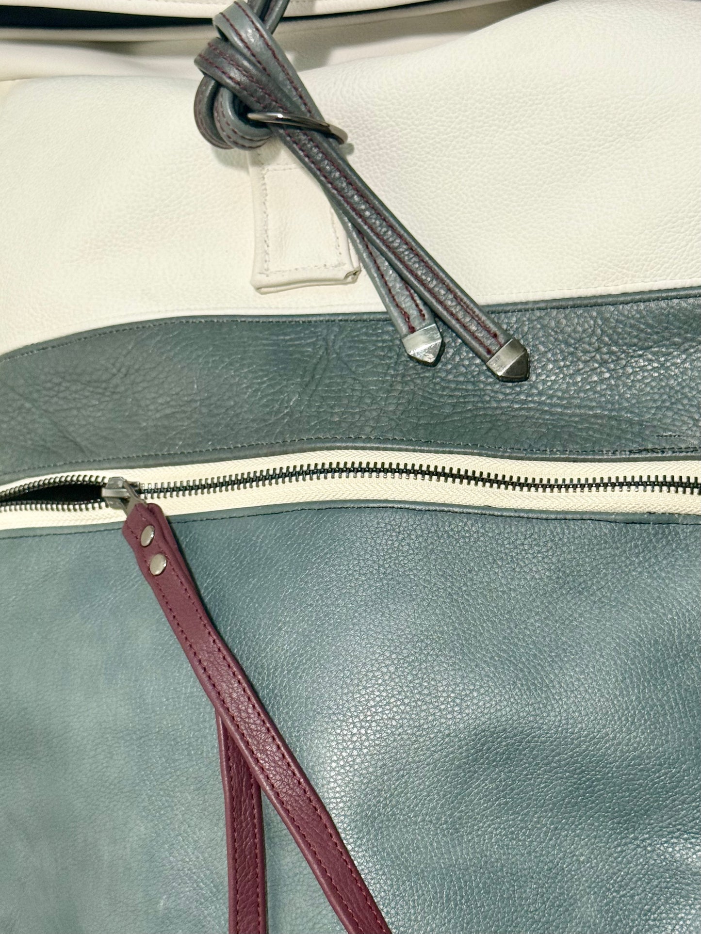 "INVADER" ROLL TOP LEATHER BACKPACK