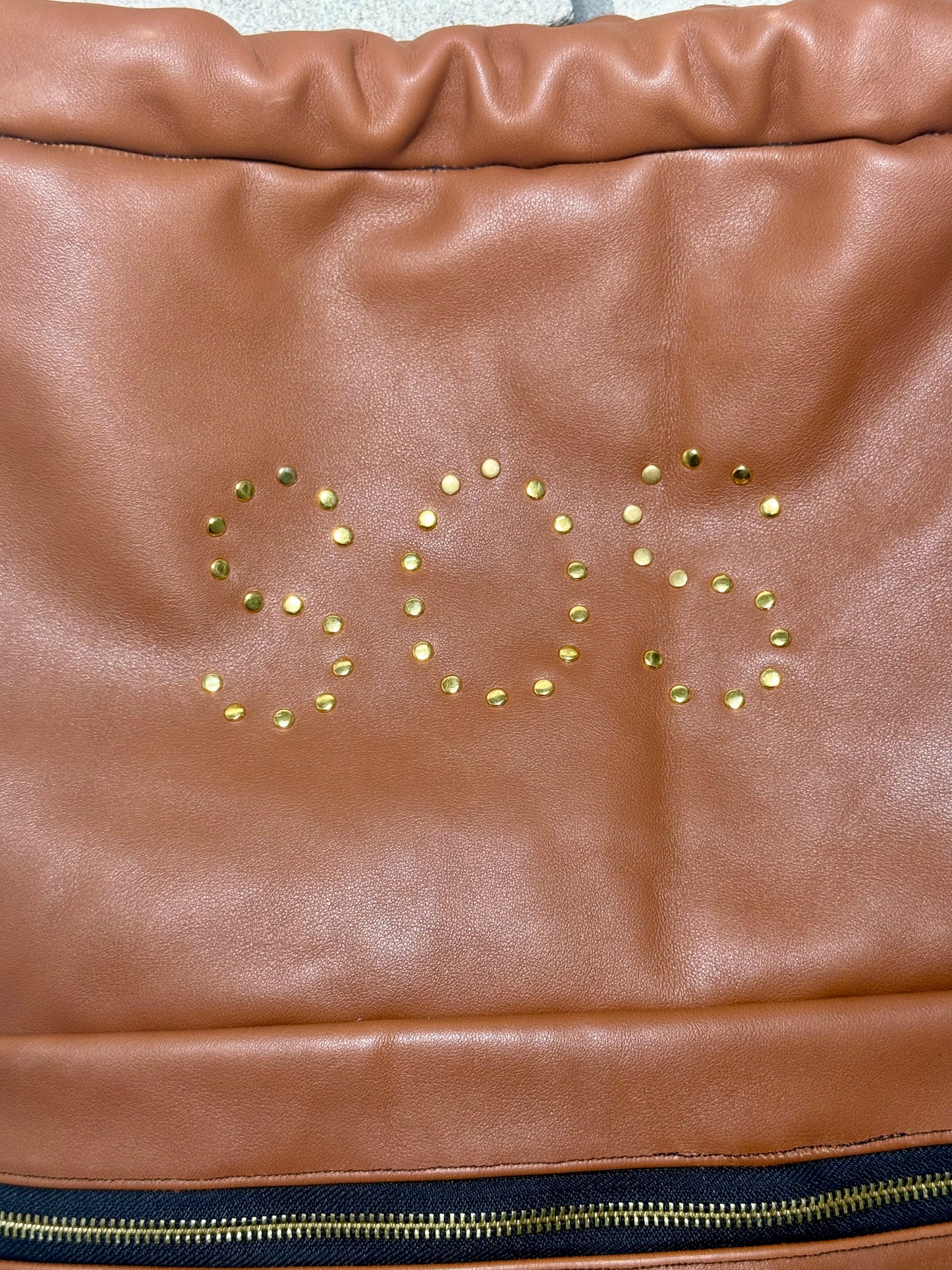 "VOYAGER" DRAWSTRING LEATHER GYM BAG