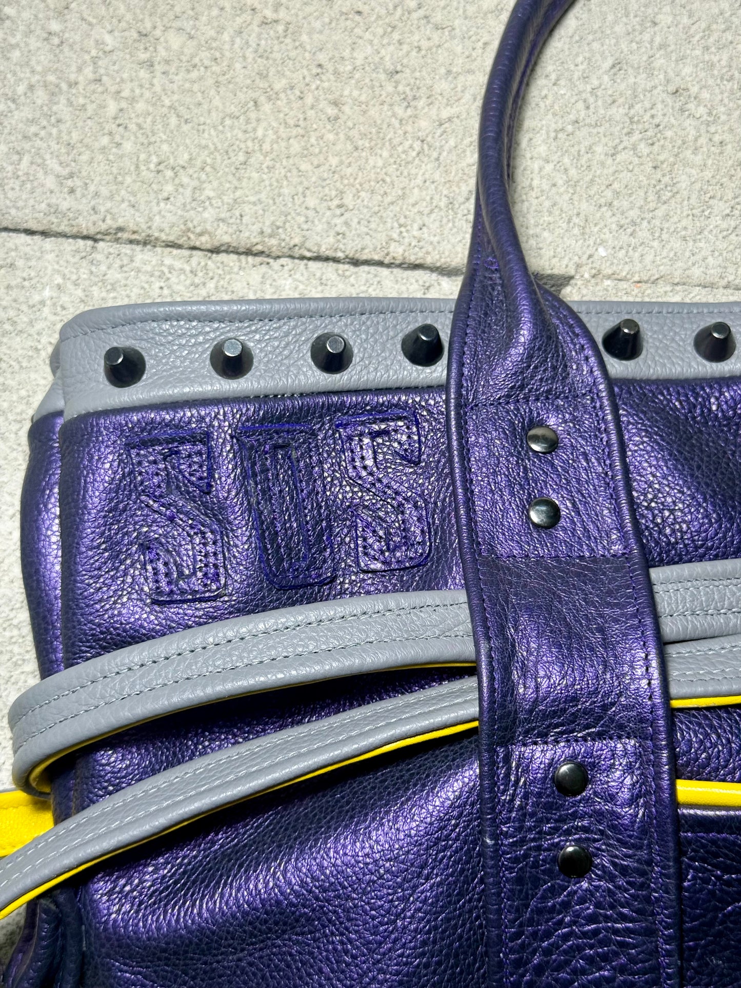 STUDDED "SPACEMAN" LEATHER TOTE