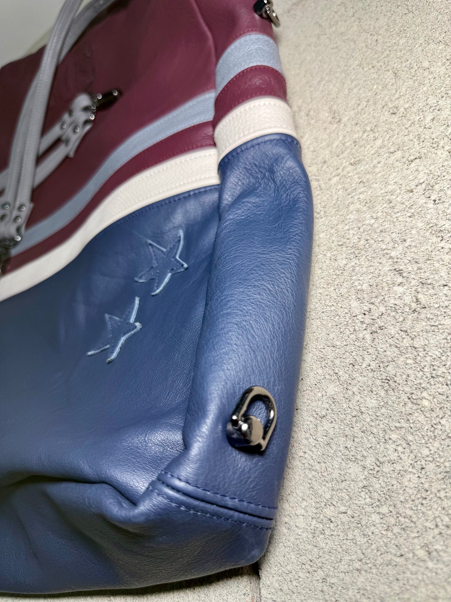 "ABYSS" CONVERTIBLE LEATHER BACKPACK